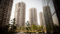 越秀地產中期淨利暴跌逾九成 管理層稱市場已過最艱難階段